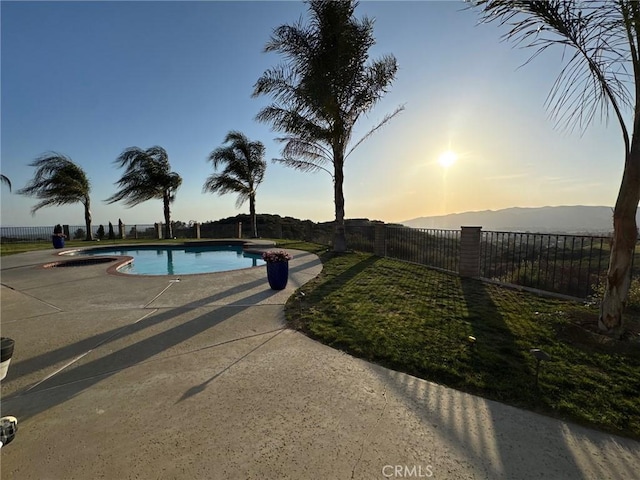 11901 Sunset Ridge Dr, Yucaipa, CA 92399 - pool at dusk featuring a patio