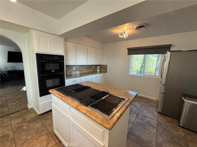 11901 Sunset Ridge Dr, Yucaipa, CA 92399 - kitchen featuring black appliances, white cabinetry, baseboards, and tasteful backsplash