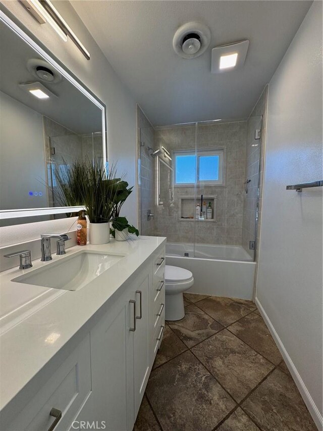 11901 Sunset Ridge Dr, Yucaipa, CA 92399 - full bath with vanity, shower / bathtub combination, toilet, and baseboards