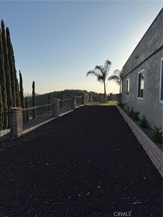 11901 Sunset Ridge Dr, Yucaipa, CA 92399 - view of yard at dusk