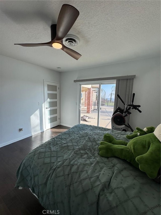 11901 Sunset Ridge Dr, Yucaipa, CA 92399 - bedroom featuring access to outside, baseboards, wood finished floors, a ceiling fan, and a textured ceiling