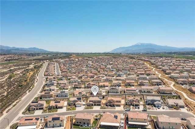 birds eye view of property featuring a residential view and a mountain view