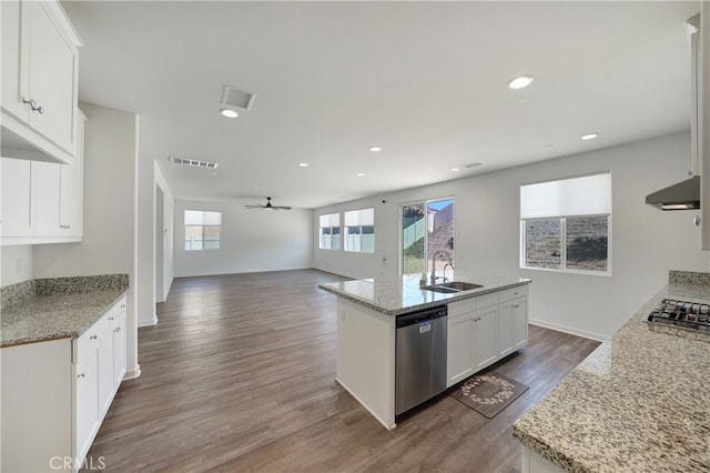 kitchen with range hood, a sink, open floor plan, a ceiling fan, and stainless steel appliances
