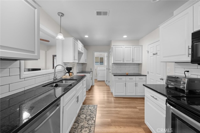 29423 Pebble Beach Dr, Menifee, CA 92586 - kitchen with stainless steel appliances, decorative backsplash, white cabinets, light wood finished floors, and recessed lighting