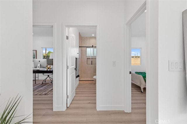 8491 Emerado Pl, Westminster, CA 92683 - hallway featuring baseboards and light wood-type flooring