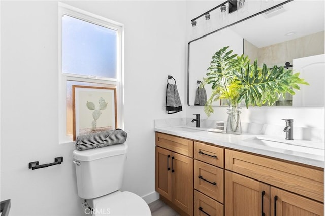 8491 Emerado Pl, Westminster, CA 92683 - full bathroom featuring double vanity, toilet, and a sink
