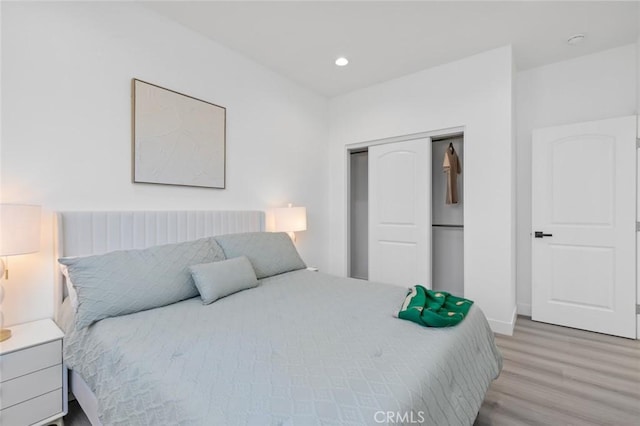8491 Emerado Pl, Westminster, CA 92683 - bedroom featuring baseboards, recessed lighting, wood finished floors, and a closet