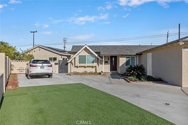 8491 Emerado Pl, Westminster, CA 92683 - ranch-style house featuring roof with shingles, driveway, fence, a front yard, and stucco siding