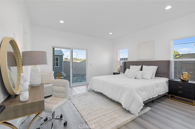 8491 Emerado Pl, Westminster, CA 92683 - bedroom featuring wood finished floors, access to exterior, and multiple windows