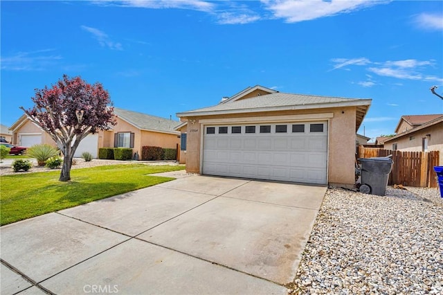 13564 Sylvan Oaks Rd, Victorville, CA 92392 - ranch-style house featuring concrete driveway, stucco siding, fence, and a front lawn