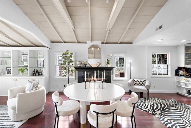 1056 Glenneyre St, Laguna Beach, CA 92651 - dining area with dark wood-style flooring and baseboards