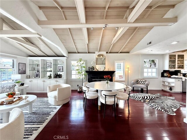 1056 Glenneyre St, Laguna Beach, CA 92651 - living room with healthy amount of natural light, dark wood-type flooring, and baseboards