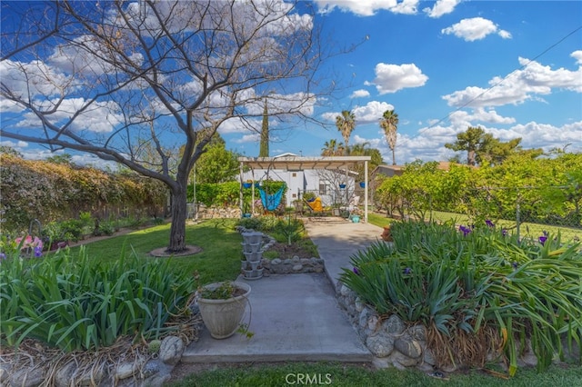 266 N 14th St, Banning, CA 92220 - view of grassy yard with a playground and a pergola