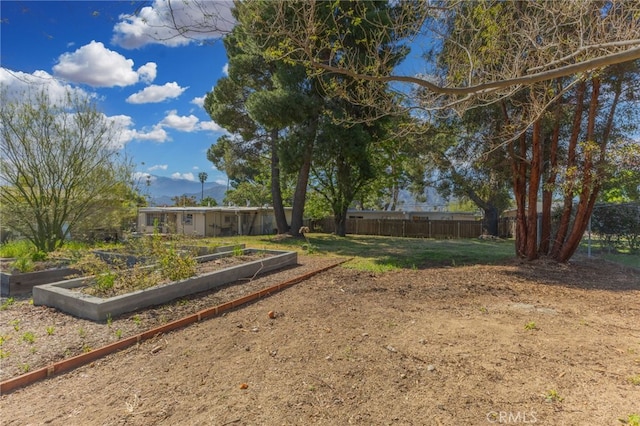 266 N 14th St, Banning, CA 92220 - view of yard with a garden and a mountain view