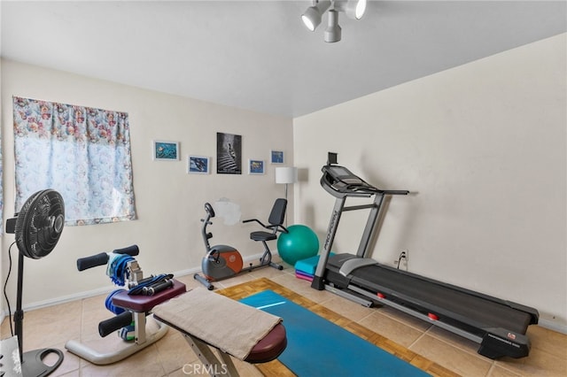 266 N 14th St, Banning, CA 92220 - workout room featuring tile patterned floors and baseboards
