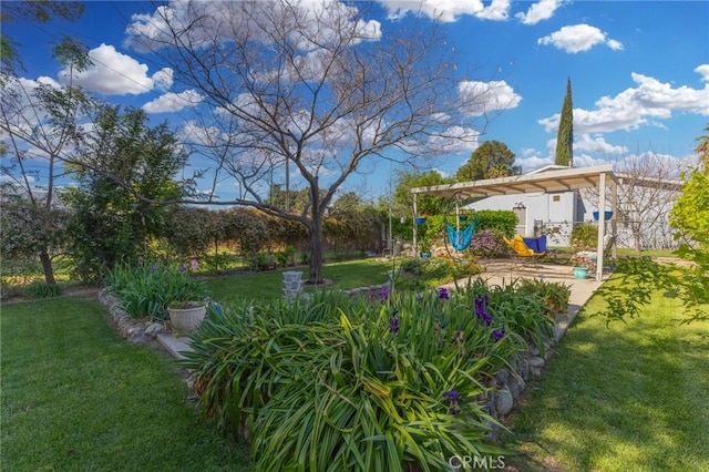 266 N 14th St, Banning, CA 92220 - view of grassy yard featuring a playground