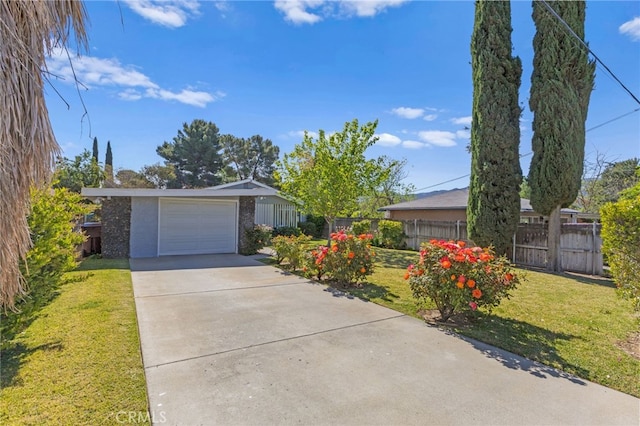 266 N 14th St, Banning, CA 92220 - view of front of home with driveway and a garage