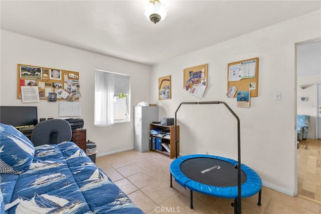 266 N 14th St, Banning, CA 92220 - bedroom with tile patterned flooring and baseboards