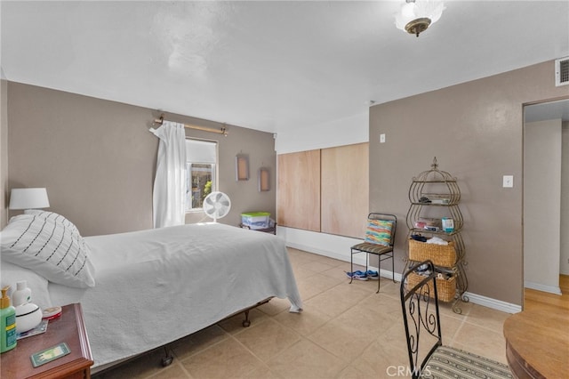 266 N 14th St, Banning, CA 92220 - bedroom with baseboards and light tile patterned floors