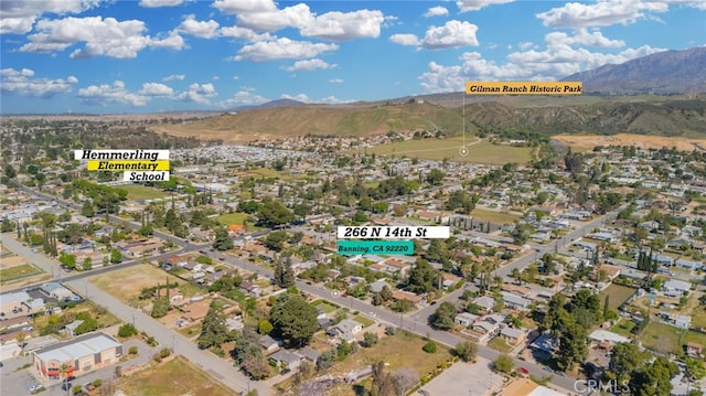 266 N 14th St, Banning, CA 92220 - aerial view of property and surrounding area featuring a mountainous background