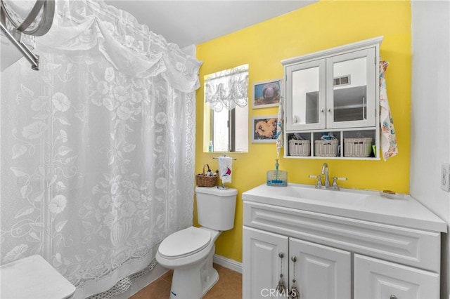 266 N 14th St, Banning, CA 92220 - full bathroom with vanity, toilet, tile patterned floors, and curtained shower
