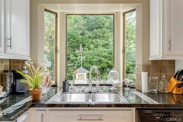 2180 Benson Ave, Cambria, CA 93428 - kitchen featuring plenty of natural light, dishwasher, white cabinetry, and a sink