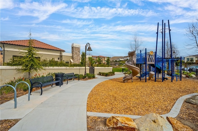 community play area featuring fence