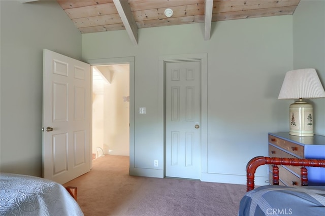 carpeted bedroom featuring wood ceiling and vaulted ceiling with beams