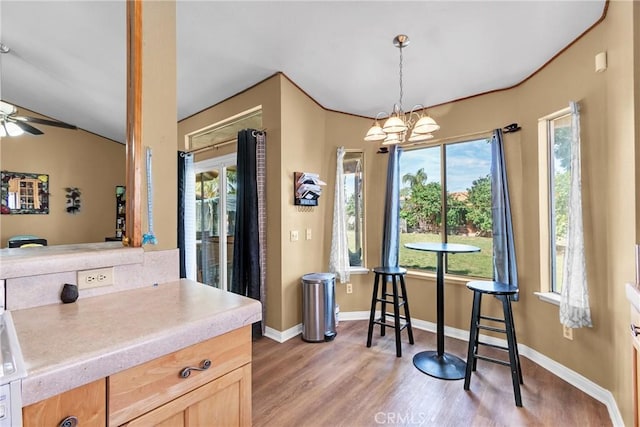 25351 Chicago Ave, Hemet, CA 92544 - interior space with a wealth of natural light, light wood-style floors, ceiling fan with notable chandelier, and baseboards
