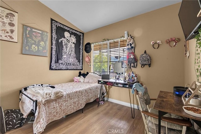25351 Chicago Ave, Hemet, CA 92544 - bedroom featuring baseboards, vaulted ceiling, and wood finished floors