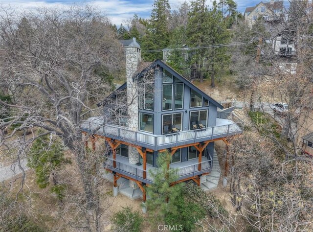 27637 St Bernard Ln, Lake Arrowhead, CA 92352 - rear view of property with a chimney