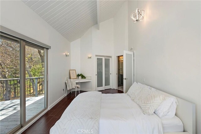27637 St Bernard Ln, Lake Arrowhead, CA 92352 - bedroom with access to outside, high vaulted ceiling, dark wood-type flooring, and baseboards