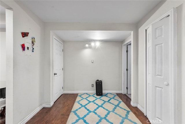 2619 Trinity St, Los Angeles, CA 90011 - corridor with dark wood-style floors and baseboards