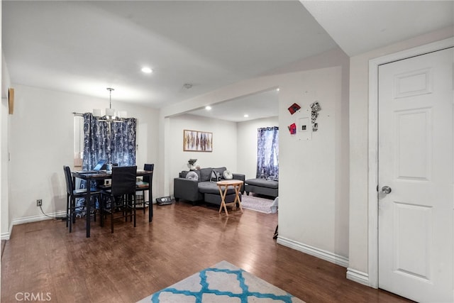 2619 Trinity St, Los Angeles, CA 90011 - dining room featuring a chandelier, wood finished floors, baseboards, and recessed lighting