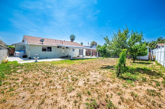 25176 Silent Creek Rd, Moreno Valley, CA 92553 - back of property featuring a patio