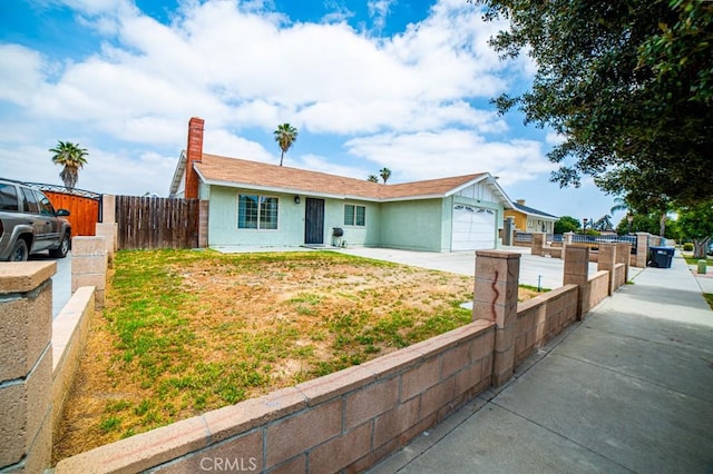 25176 Silent Creek Rd, Moreno Valley, CA 92553 - single story home featuring a garage, stucco siding, concrete driveway, and a chimney