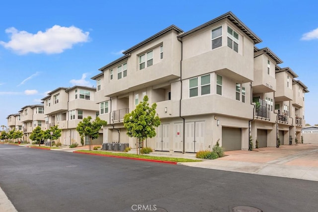1707 W Bushell, Anaheim, CA 92805 - view of property featuring a residential view and a garage