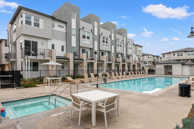 1707 W Bushell, Anaheim, CA 92805 - community pool featuring a residential view, a community hot tub, fence, and a patio