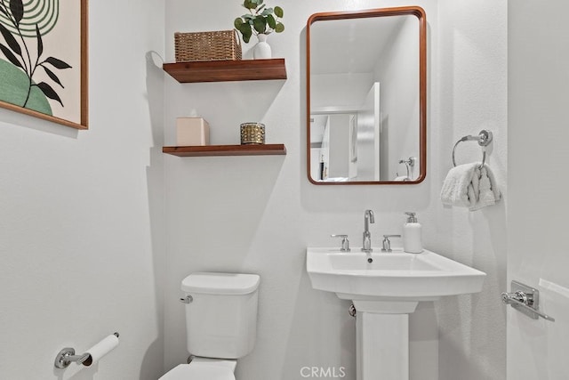 1707 W Bushell, Anaheim, CA 92805 - half bathroom featuring a sink and toilet