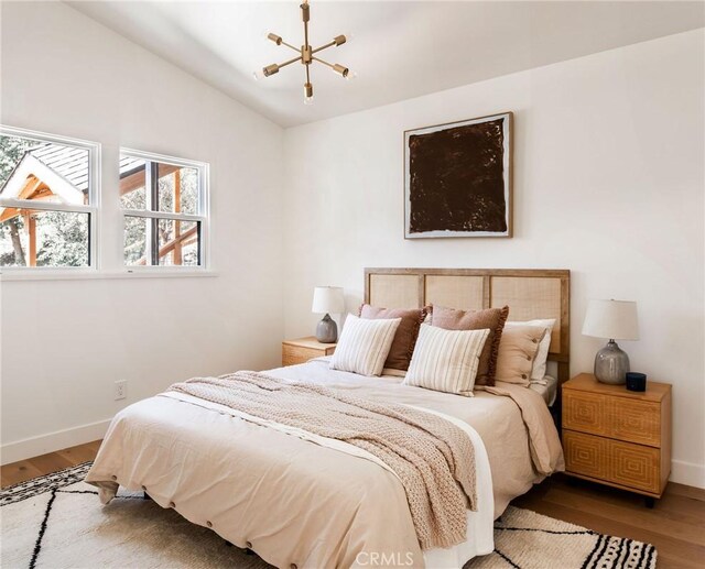 521 Fremont Dr, Pasadena, CA 91103 - bedroom with wood finished floors and lofted ceiling