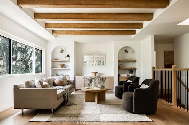 521 Fremont Dr, Pasadena, CA 91103 - living area with built in shelves, wood finished floors, and beam ceiling