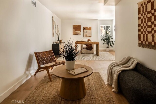 521 Fremont Dr, Pasadena, CA 91103 - sitting room featuring wood finished floors and baseboards