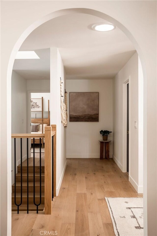 521 Fremont Dr, Pasadena, CA 91103 - hallway with wood finished floors and arched walkways