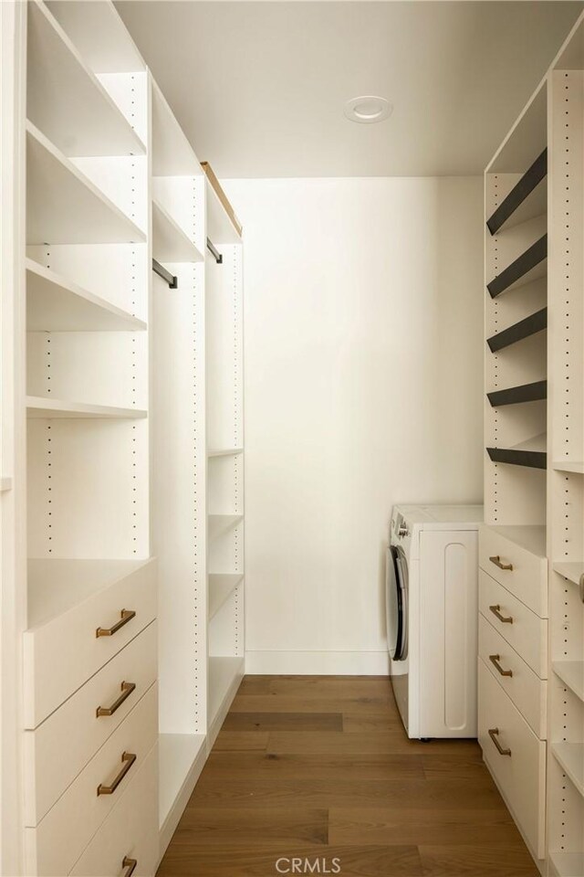 521 Fremont Dr, Pasadena, CA 91103 - spacious closet featuring wood finished floors and washer / dryer