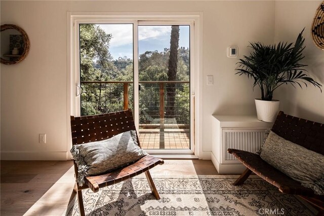 521 Fremont Dr, Pasadena, CA 91103 - sitting room with plenty of natural light and wood finished floors