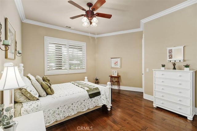 bedroom with ornamental molding, baseboards, dark wood-style floors, and visible vents