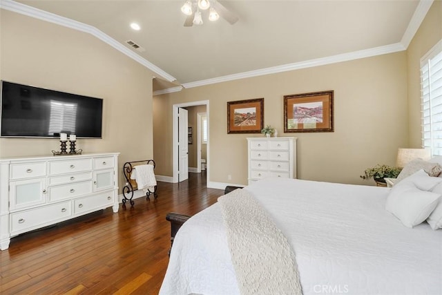bedroom featuring ceiling fan, dark wood-type flooring, ornamental molding, visible vents, and baseboards