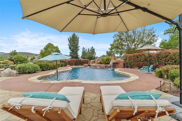 pool with a patio