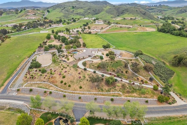 drone / aerial view with a rural view and a mountain view