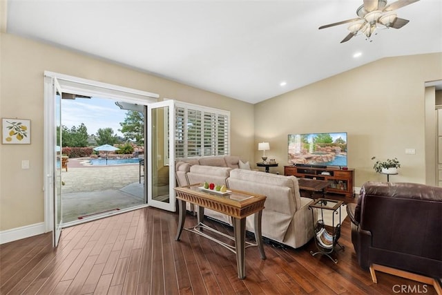living room with dark wood finished floors, baseboards, recessed lighting, lofted ceiling, and ceiling fan